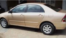 A picture of Very Clean Tokunbo TOYOTA COROLLA Excellent alloy Rims and Gold