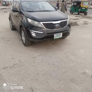 A picture of Kia Sportage 2013 model sound engine gear ac chilling some