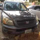 A picture of Honda pilot 04 model everything intact going for 1.4m Call