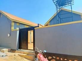 A picture of 15 single rooms for sale in bulenga just 1 km