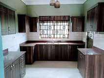 A picture of Brand New House for sale in Kyanja 4bedrooms_3bathrooms_boys_quarter seated on