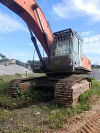 A picture of Excavator Wheel loader and hydraulic crawler drill.