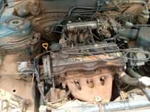 A picture of Toyota Corolla Lift back Manual gear Engine smokes Little Good