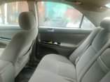 A picture of Registered Uber standard camry 05 buy n drive with all