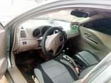 A picture of Nissan Altima engine ac cool gear perfect location 0werri 07040637386