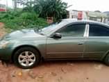 A picture of Nissan Altima engine ac cool gear perfect location 0werri 07040637386