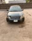 A picture of Toyota Corolla 03 04 Engine gear ac Painted After U