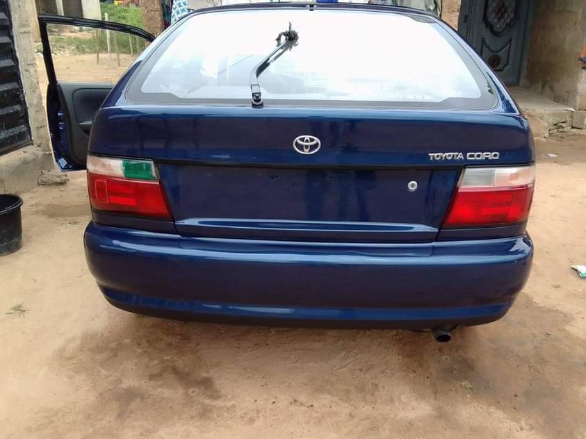 A picture of Toyota Corolla is available engine and gear is ok