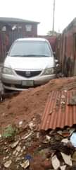 A picture of Mazda mpv engine smoking fastest finger drives well