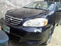 A picture of Fastest finger Toyota Corolla with chilling ac engine and gear