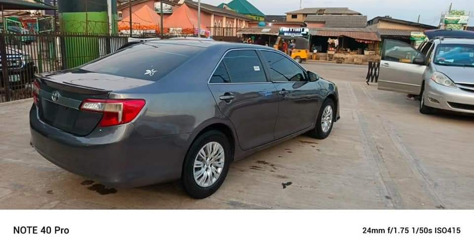 A picture of Toks Standard 2014 Toyota Camry absolutely buy and drive