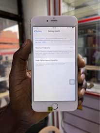 A picture of iPhone 6 Plus 64GB at Shs 210k only . Fully