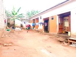 A picture of 4 single rooms for sale just after bulenga 2 km