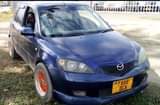 A picture of MAZIDA DEMIO ML 4.8 Spot reem CC 1300 LOCATION MBEYA