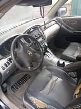 A picture of 2004 Toyota Highlander Engine is tapping but Gear and AC