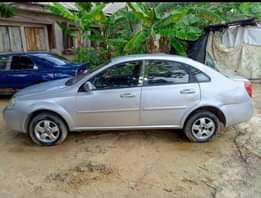 A picture of CHEVROLET OPTRA IS ENGINE GEAR AC CHILLING BODY OKA NOTE