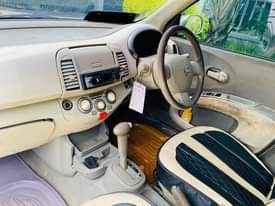 A picture of NISSAN MARCH IWAHI MAPEMA USILEMBE
