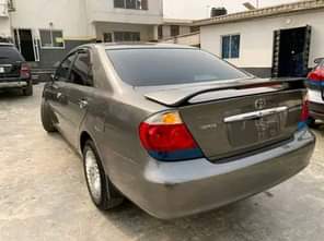 A picture of REGISTERED 2005 TOYOTA CAMRY LE Reverse Camera Navigation System 1yr