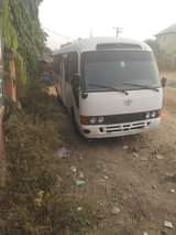 A picture of Clean Toyota Coaster bus Good engine Good tyres Buy and