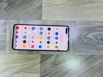 A picture of One Plus 9 5G 256Gb Ram 12Gb Bei 600k