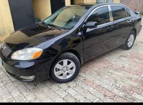 A picture of Sharp buy and drive 2004 Toyota Corolla with nothing to