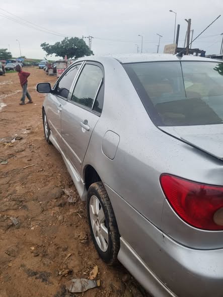 A picture of Distress Distress Distress a very clean Toyota corolla with untampered