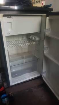 A picture of Hot point min fridge