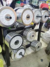A picture of Gym equipments and dumbbells
