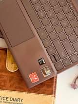 A picture of BRAND NEW BRAND NEW HP ENVY SUPER SLIM BROWN COLOR