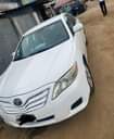 A picture of She Barely drive this car neatly used by a woman