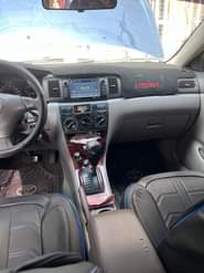 A picture of Toyota corolla 2006 SIX Months used Engine Gear Interior sharp