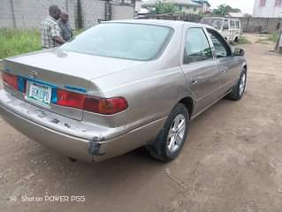 A picture of Super clean Toyota Camry Drop light Everything working well Engine