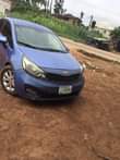 A picture of 2013 Kia Rio bought brand buy and travel everything working