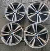 A picture of 19 ORIGINAL BMW MAGS WIDE AND NARROW. MAGS ARE IN
