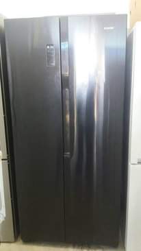 A picture of Fridge freezer and washing machine