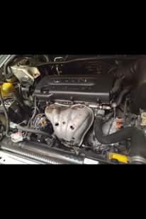A picture of 4plug Toyota Highlander with 3rd seat