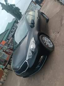 A picture of Sharpest clean 2014 Toks standard registered Kia Cerato.