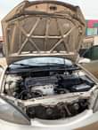 A picture of Toyota Camry 2004 4 plug Tokunbo engine Flashed on first