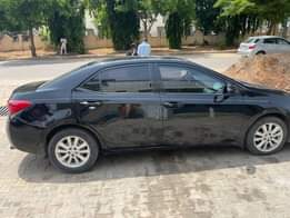 A picture of Toyota Corolla 2016with the owner presently in Abuja Car is