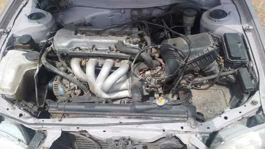 A picture of Toyota Corolla Engine Gear AC Working perfectly Painted N1 2M
