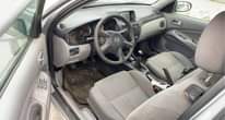 A picture of Nissan Almera 05 Nigerian used like toks