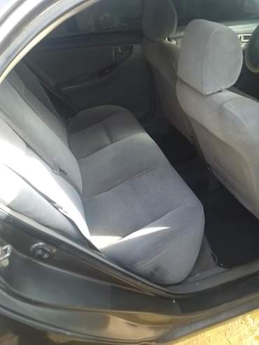 A picture of Toyota Corolla 04 engine ac and gear working well painted