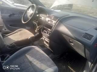 A picture of Toyota picnic bus Nigeria used Just few fault Buy and