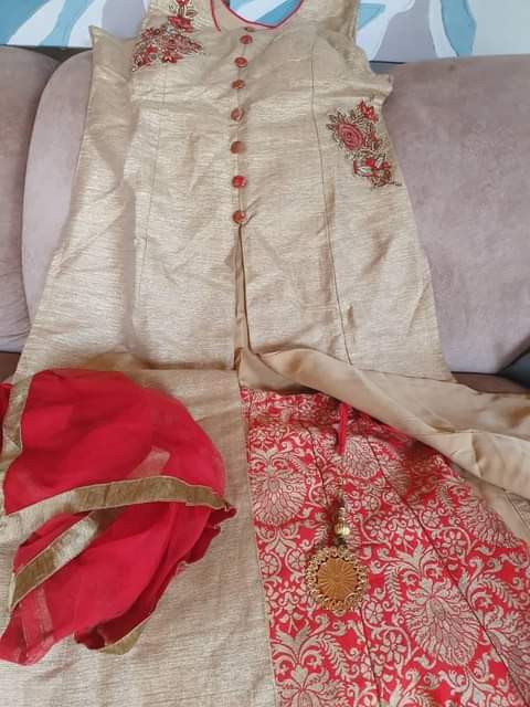 A picture of Gagra dress Indian design Gold and Red XL