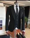 A picture of We do custom made suits PESHS CLOTHING HUB KAMPALA