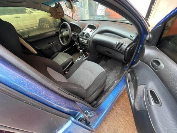 A picture of 206 automatic buy and drive location Abuja kurudu engine ac