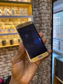 A picture of SAMSUNG S6EDGE 32GB AT UGSHS 220 000CLEAN MASAVU WATSP CAL