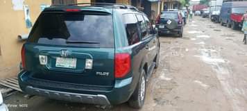 A picture of MODEL Honda Pilot YEAR 04 TYPE Naija Used CONDITON Ac