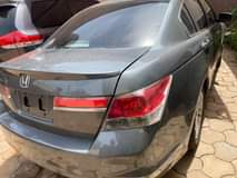 A picture of HONDA ACCORD 2011 MODEL AT GOOD CONDITION DRIVES SMOOTH MONEY