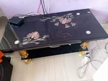 A picture of NAUZA DINNING TABLE YA KIOO VITI V 4 NA MEZA